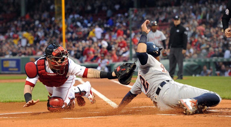Christian Vazquez tags out Leonys Martin. Christian Vazquez tags out Leonys Martin.